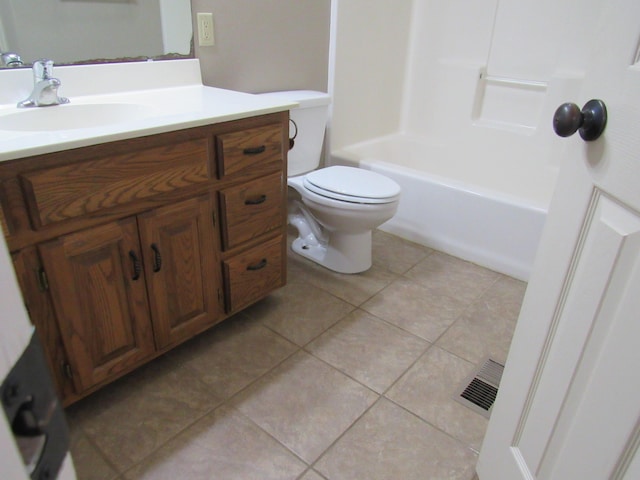 full bathroom featuring tile patterned flooring, vanity, toilet, and tub / shower combination