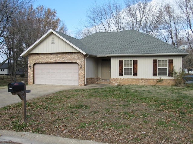 ranch-style house with a garage and a front yard