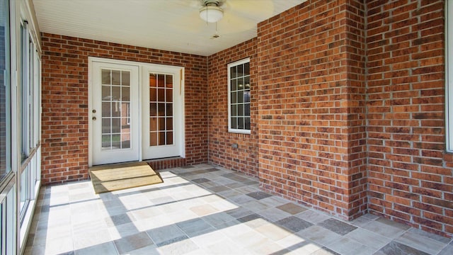 view of patio featuring ceiling fan