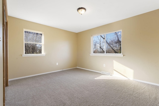 view of carpeted spare room