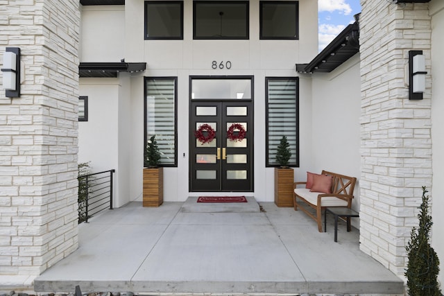 doorway to property with french doors