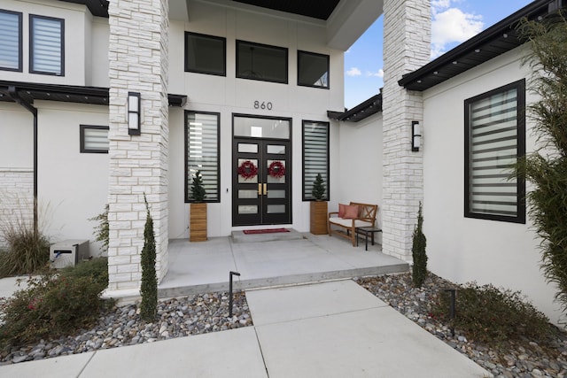 doorway to property with french doors