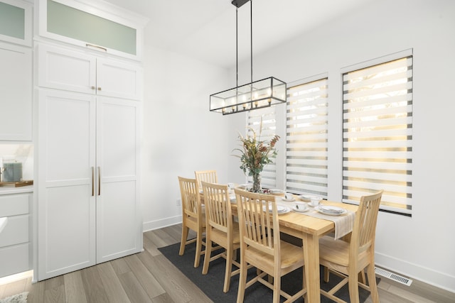 dining area with light wood-type flooring