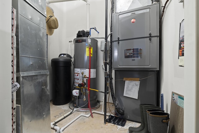 utility room featuring gas water heater