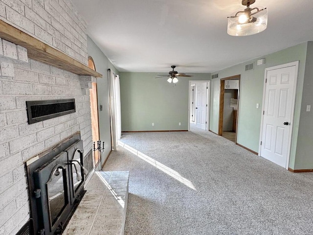 unfurnished living room featuring ceiling fan and light colored carpet