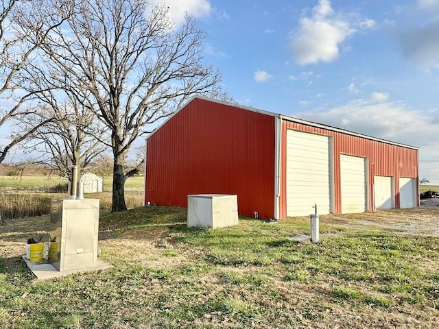 view of outdoor structure with a garage