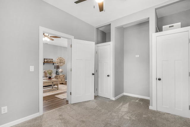 unfurnished bedroom with carpet and ceiling fan