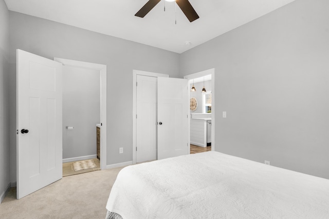 bedroom featuring ceiling fan and light colored carpet