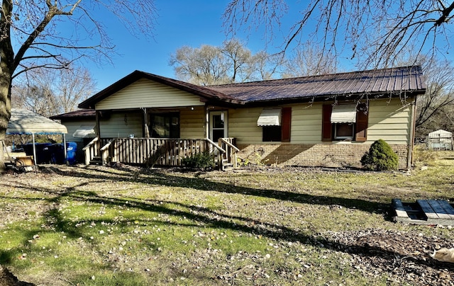 ranch-style house with a front lawn