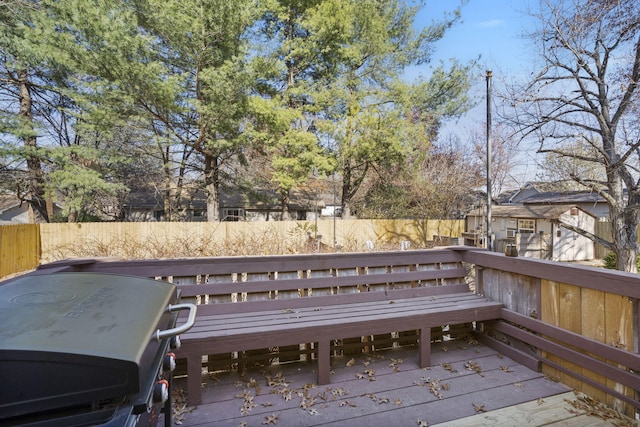 wooden terrace with grilling area