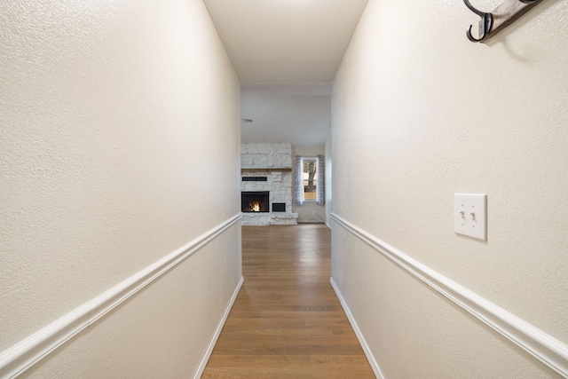 corridor featuring dark hardwood / wood-style floors