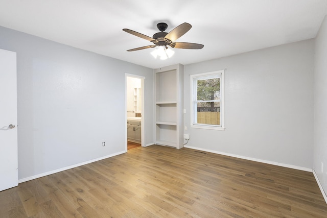 unfurnished room featuring wood-type flooring and ceiling fan