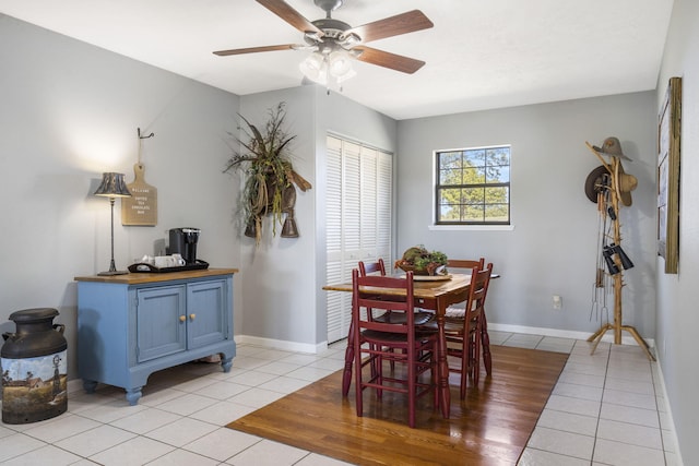 tiled dining room with ceiling fan