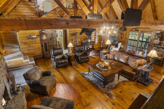 living room featuring beamed ceiling, high vaulted ceiling, hardwood / wood-style floors, and a notable chandelier