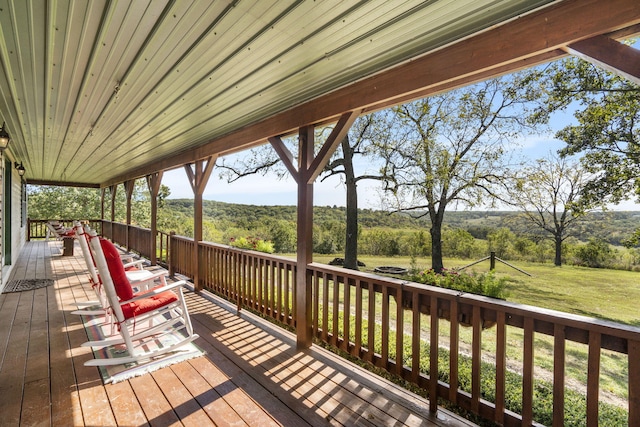 wooden deck with a yard