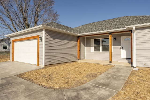 ranch-style home featuring a garage