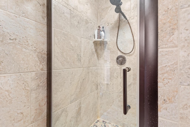 room details with a tile shower