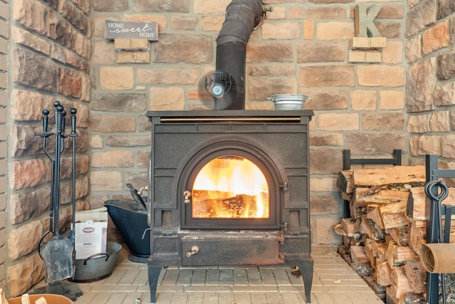 interior details featuring a wood stove