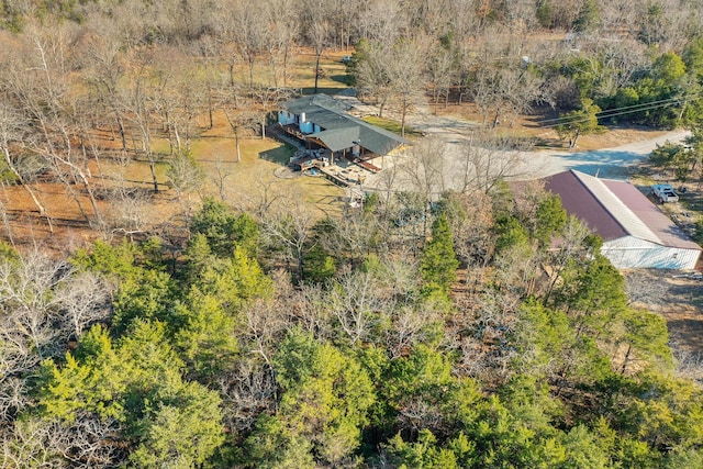 birds eye view of property with a rural view