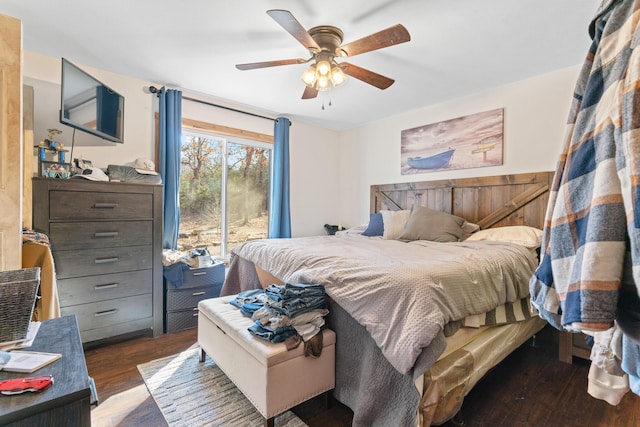 bedroom with access to exterior, dark hardwood / wood-style floors, and ceiling fan