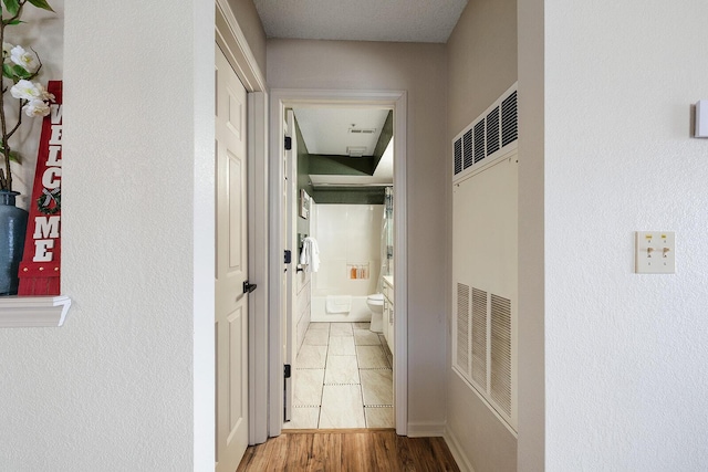 hall featuring hardwood / wood-style flooring