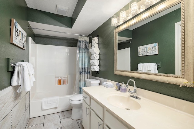 full bathroom featuring vanity, toilet, and shower / tub combo