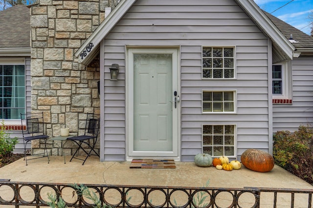 doorway to property with a patio