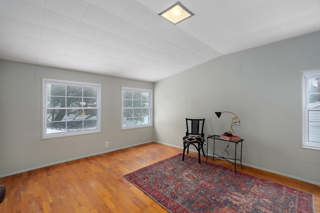 sitting room with light hardwood / wood-style floors