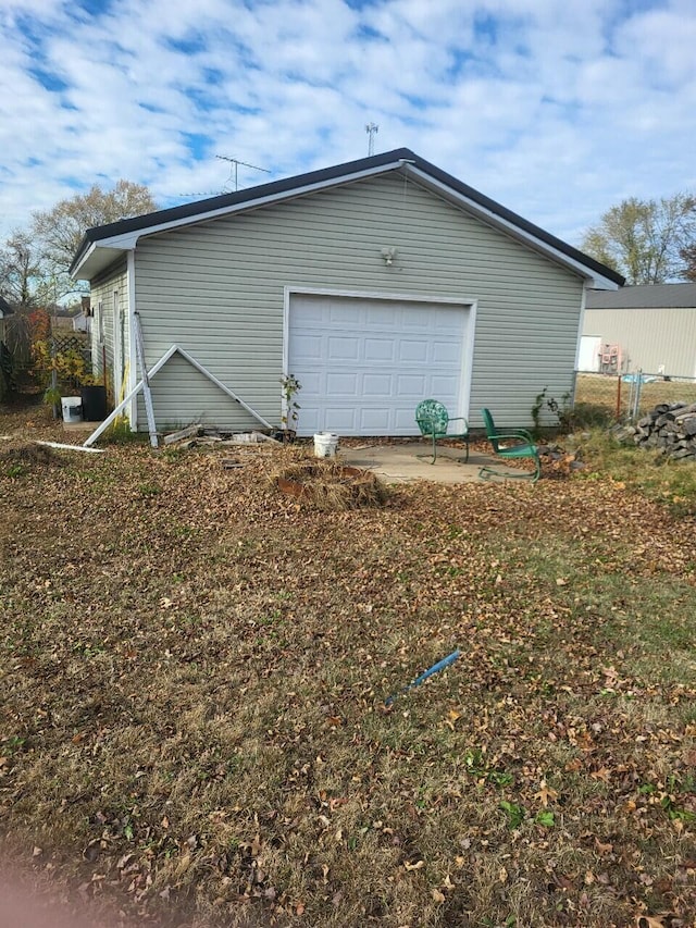 view of property exterior featuring a garage