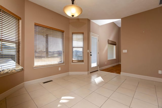 interior space with light tile patterned flooring