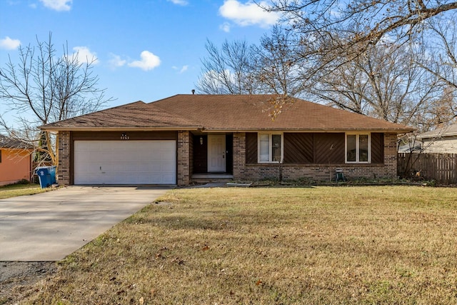 single story home featuring a front lawn and a garage