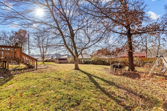 view of yard featuring a deck