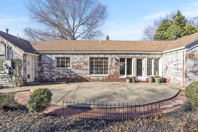 back of house featuring a patio area and french doors