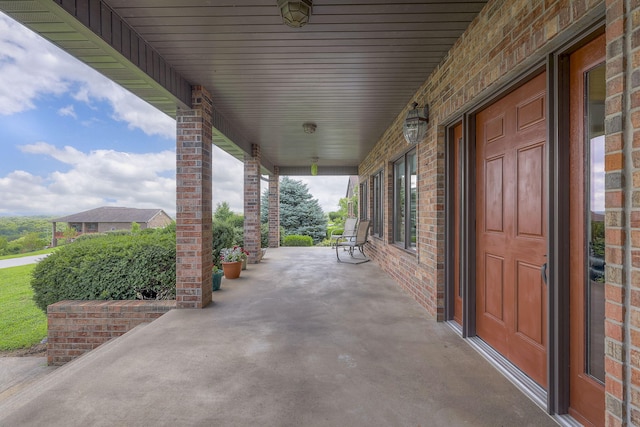 view of patio featuring a porch