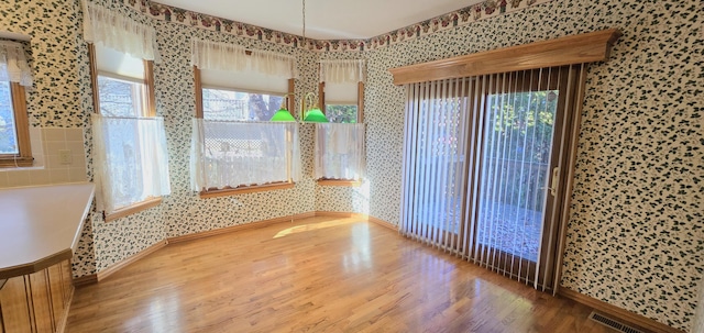 empty room featuring hardwood / wood-style flooring