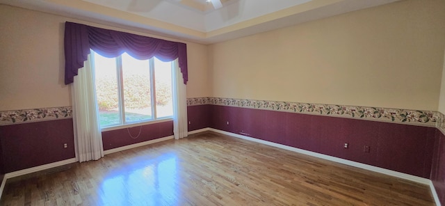 unfurnished room featuring hardwood / wood-style floors