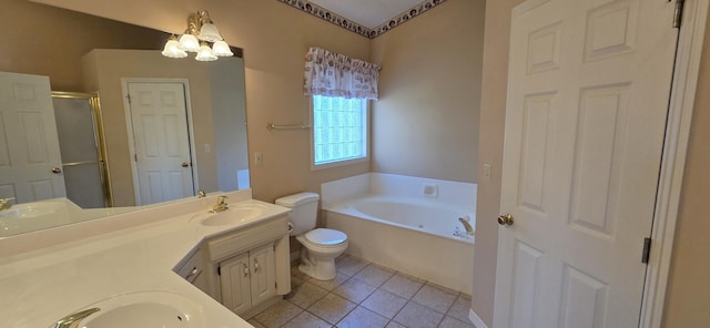 full bathroom with vanity, tile patterned floors, separate shower and tub, toilet, and a notable chandelier