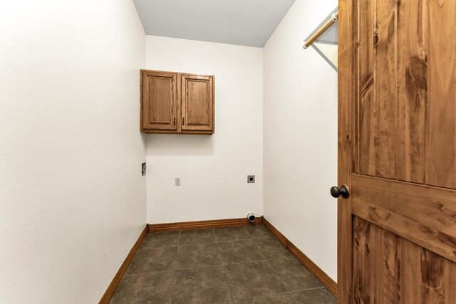 washroom featuring cabinets and hookup for an electric dryer