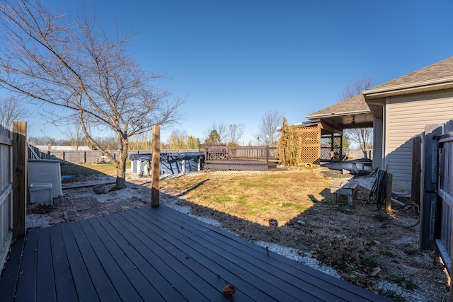 wooden terrace featuring a covered pool