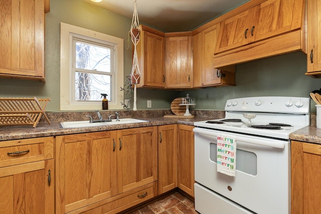 kitchen featuring white electric range, sink, and custom range hood