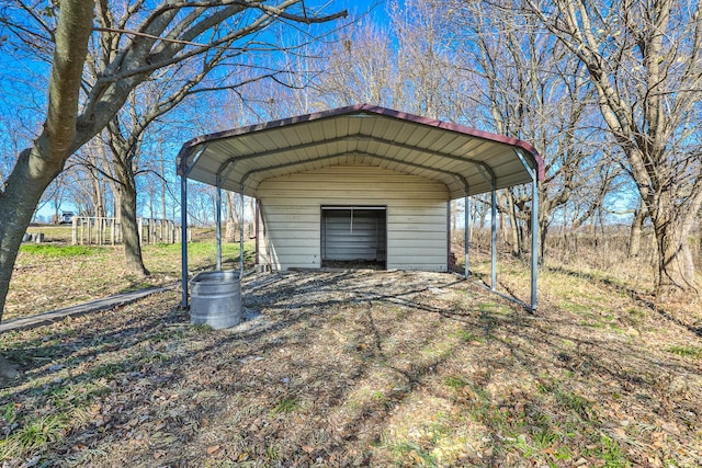 view of outbuilding featuring a carport