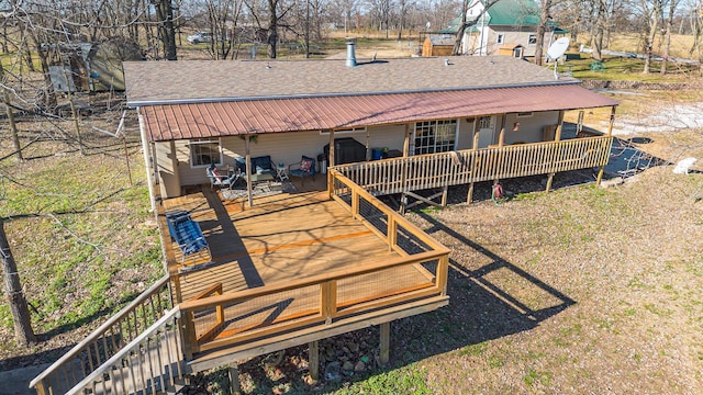 exterior space featuring a wooden deck