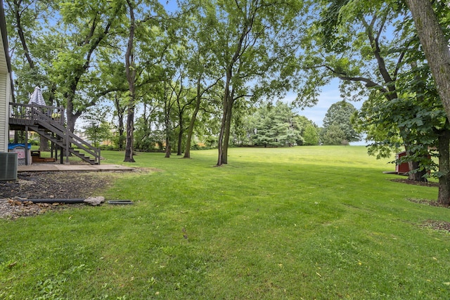 view of yard featuring a wooden deck