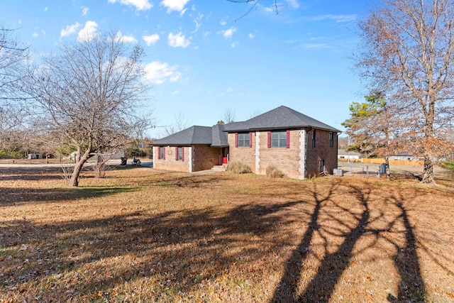 view of property exterior featuring a yard