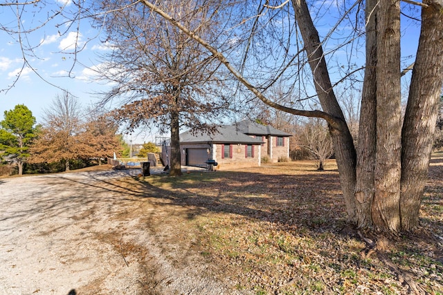 exterior space with a garage