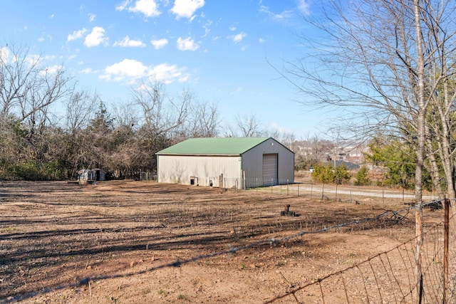 view of outbuilding featuring a garage