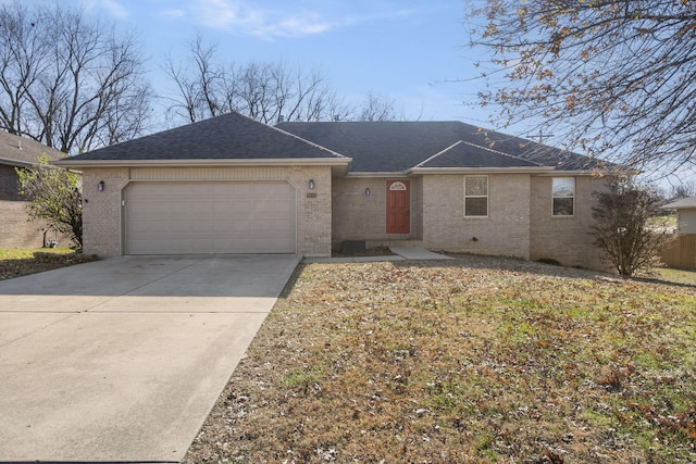 single story home with a garage