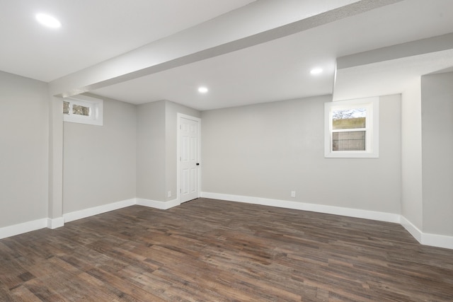 basement featuring dark wood-type flooring