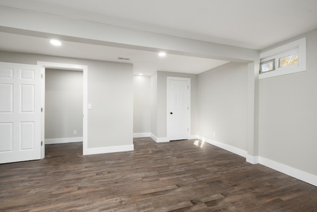 basement with dark wood-type flooring