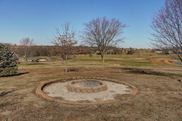 view of yard with a rural view